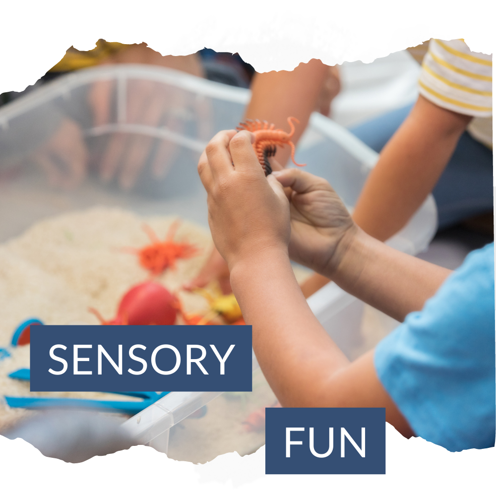 Toddlers engaging in sensory fun